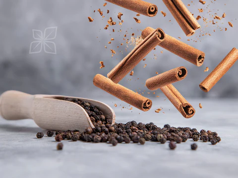 Cinnamon sticks and pepper